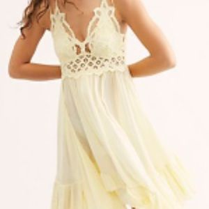 Free people Adele dress in daffodil colour, size small.